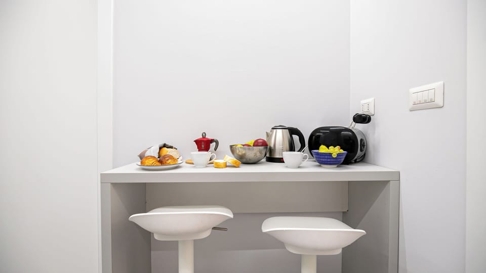 Apartment (2 Bedrooms) | Private kitchen | Espresso maker, microwave, electric kettle, highchair