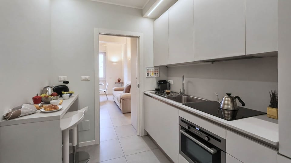 Apartment (2 Bedrooms) | Private kitchen | Espresso maker, microwave, electric kettle, highchair
