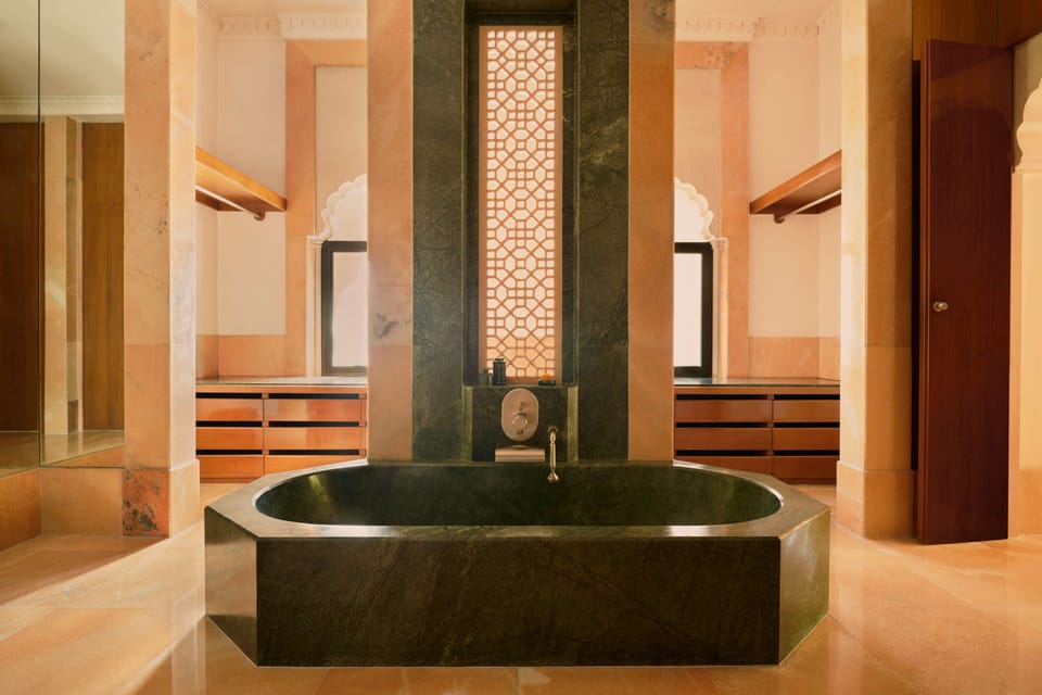 Separate tub and shower, free toiletries, bathrobes, towels