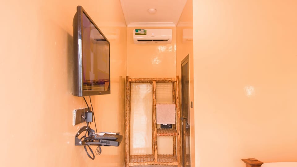 Double or Twin Room, Balcony, Garden View | Television
