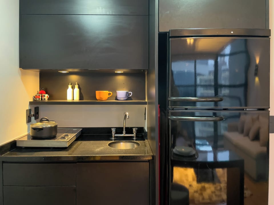 Apartment | Private kitchen | Fridge, microwave, stovetop, cookware/dishes/utensils