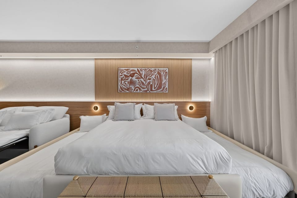 Apartment (0 Bedroom) | Laptop workspace, iron/ironing board, bed sheets