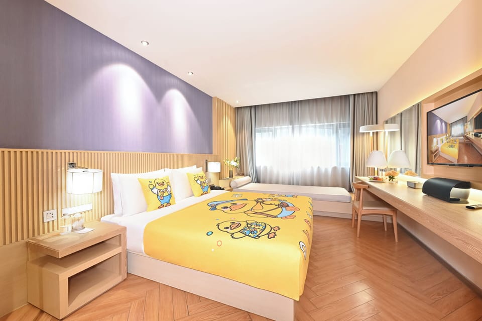 Family Triple Room | Premium bedding, down comforters, pillowtop beds, minibar (free items)