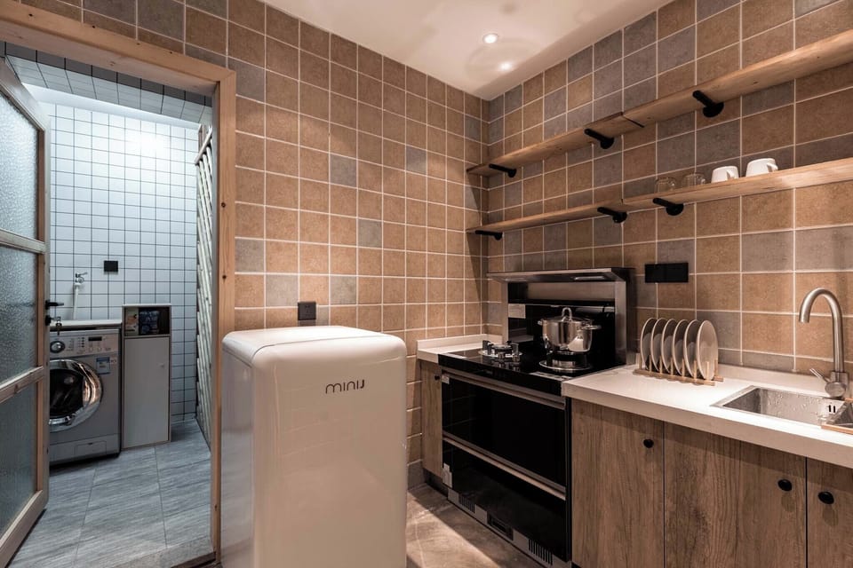 Luxury Suite, Balcony, River View | Private kitchen | Coffee/tea maker, stovetop, electric kettle, cookware/dishes/utensils