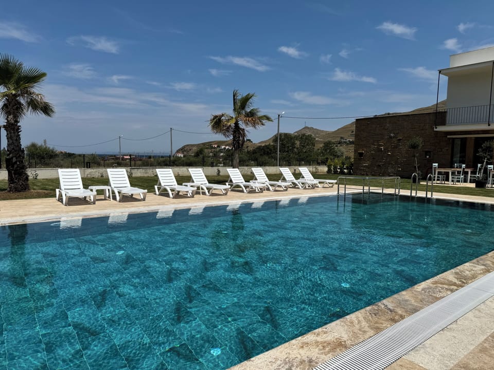 Basic Twin Room, Balcony, Garden View | Pool | Seasonal outdoor pool
