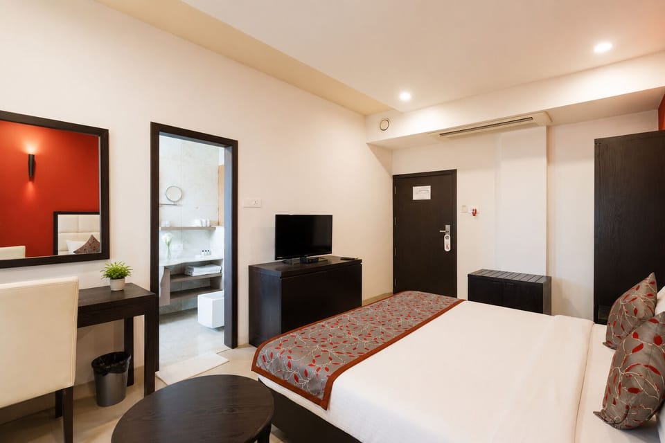 Premium King Room | Blackout drapes, iron/ironing board (on request), WiFi (free)