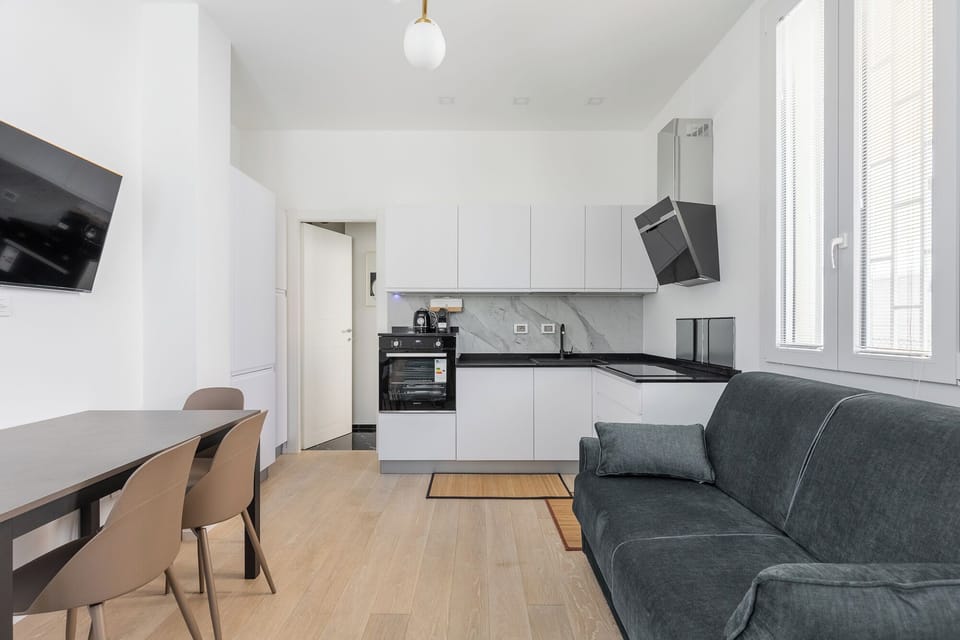 Apartment, 1 Bedroom | Living area | 30-inch TV with satellite channels