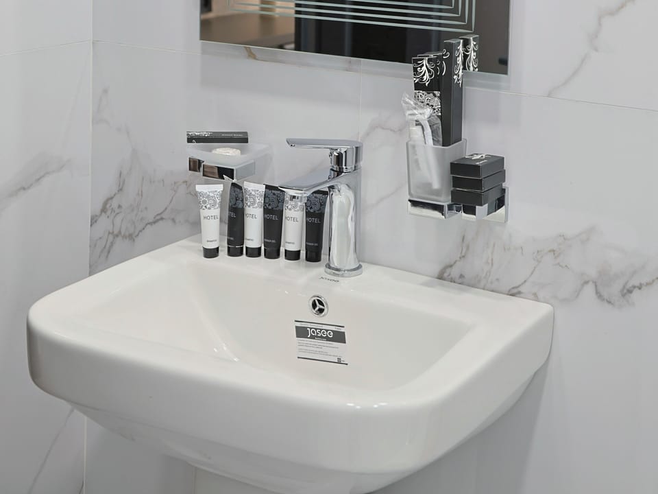 Superior Room, City View | Bathroom | Shower, hair dryer, towels, soap