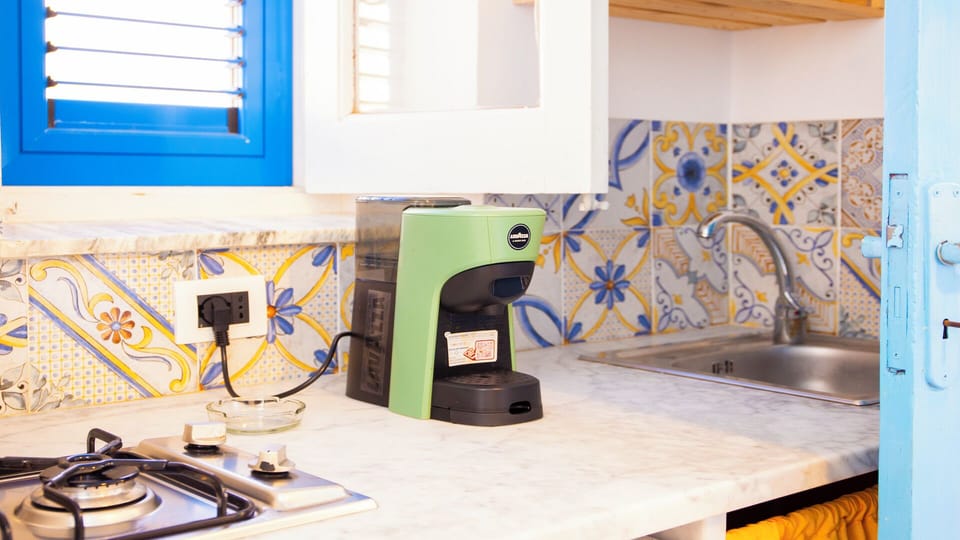 Apartment, Partial Ocean View | Private kitchen | Fridge, stovetop, cookware/dishes/utensils