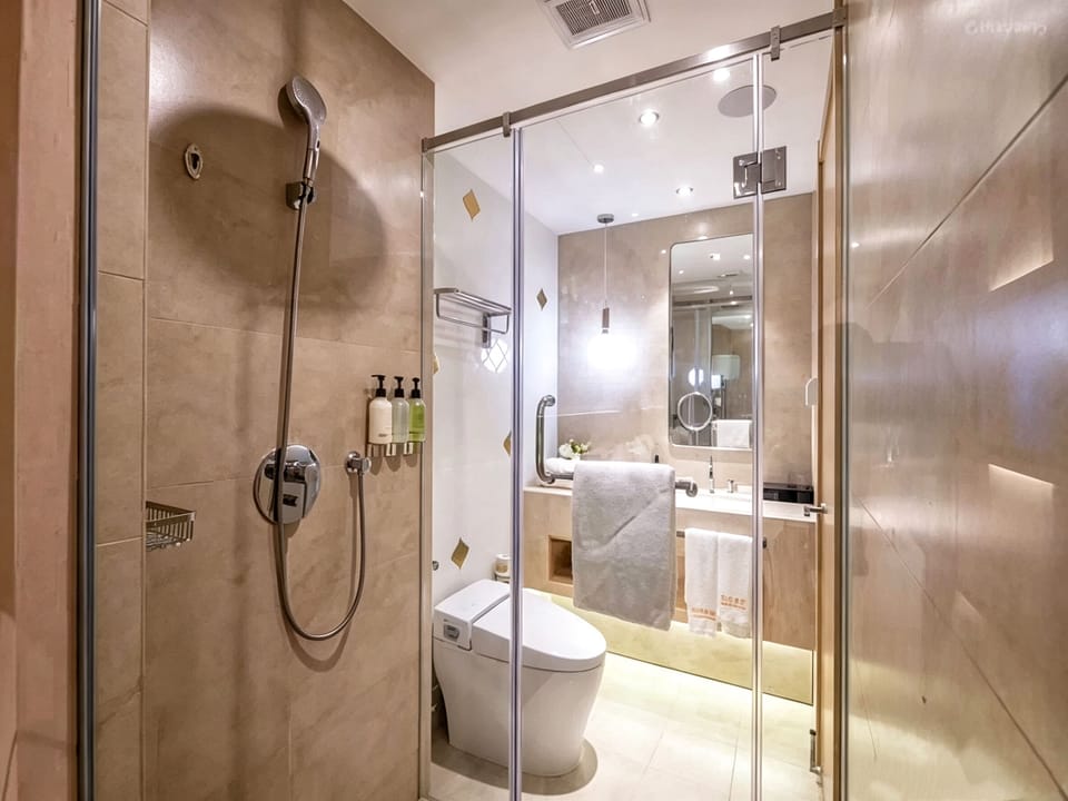 Shower, hair dryer, bathrobes, slippers