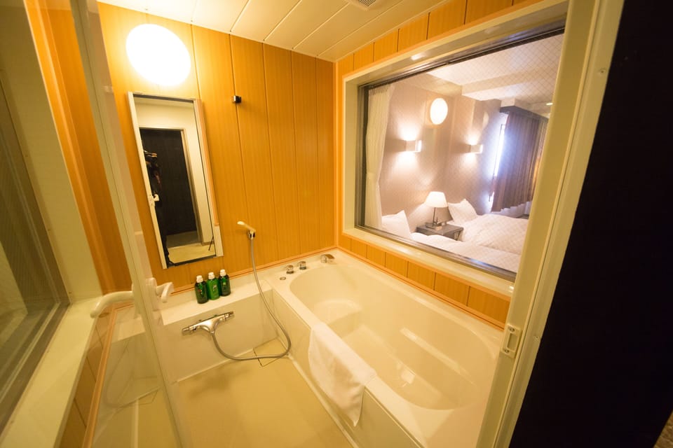 Shower, free toiletries, hair dryer, slippers