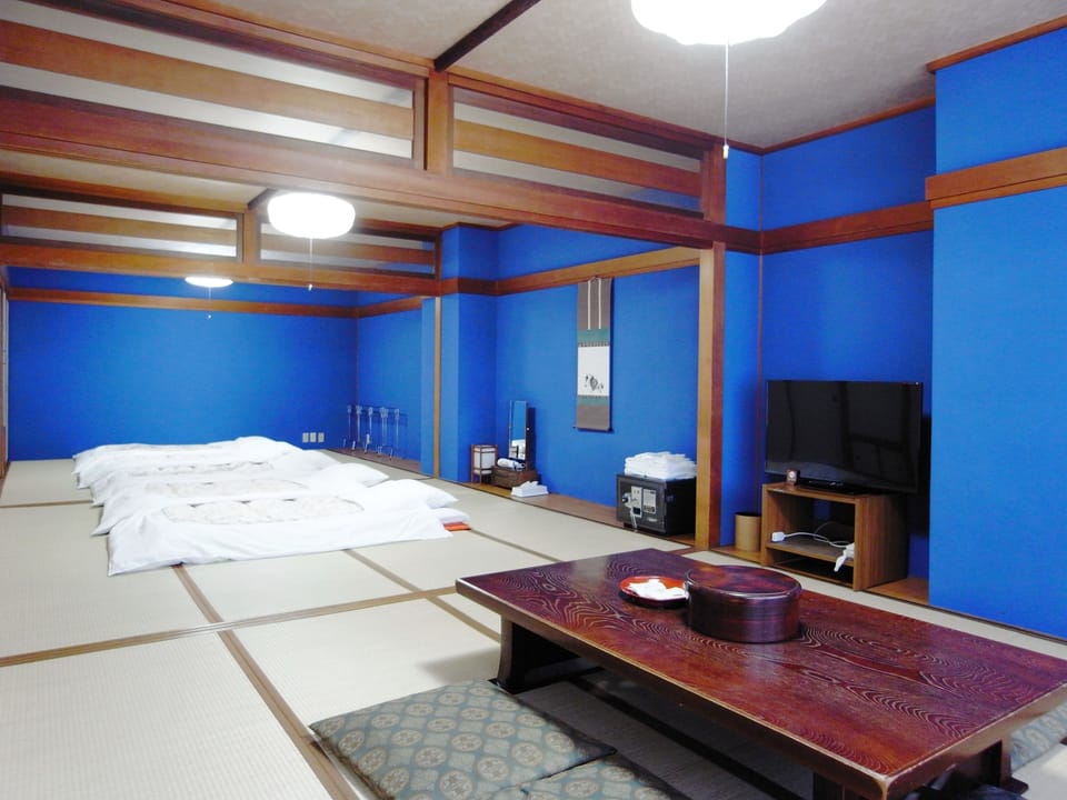 Japanese Style Family Room with Shared Bathroom | Individually decorated, individually furnished, desk, iron/ironing board