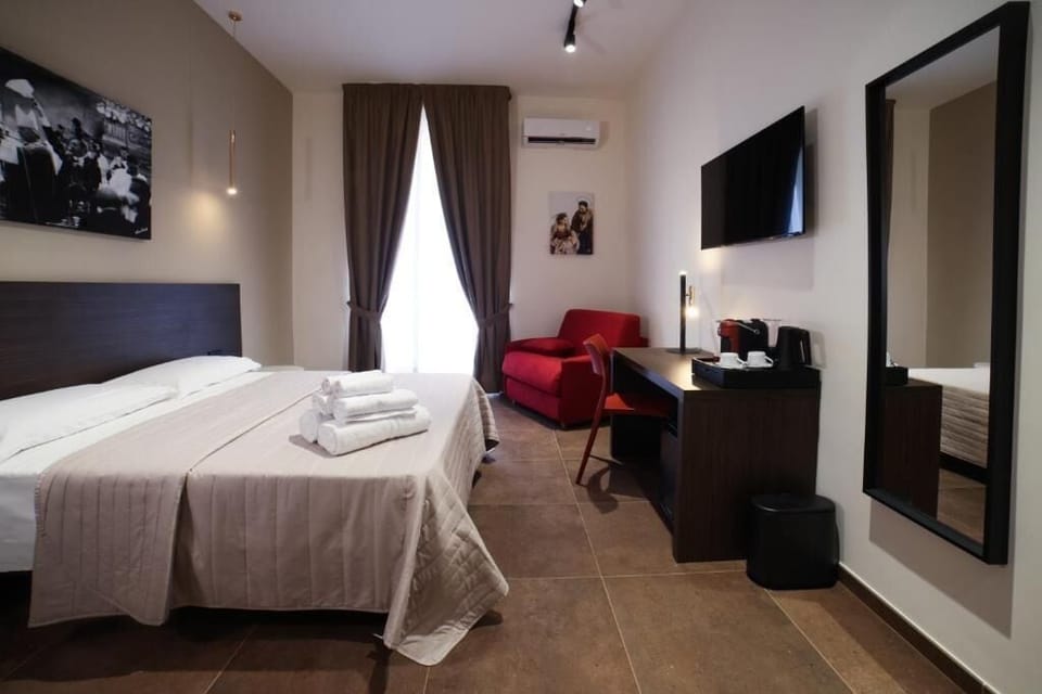 Deluxe Triple Room, Balcony, City View | In-room safe, blackout drapes, soundproofing