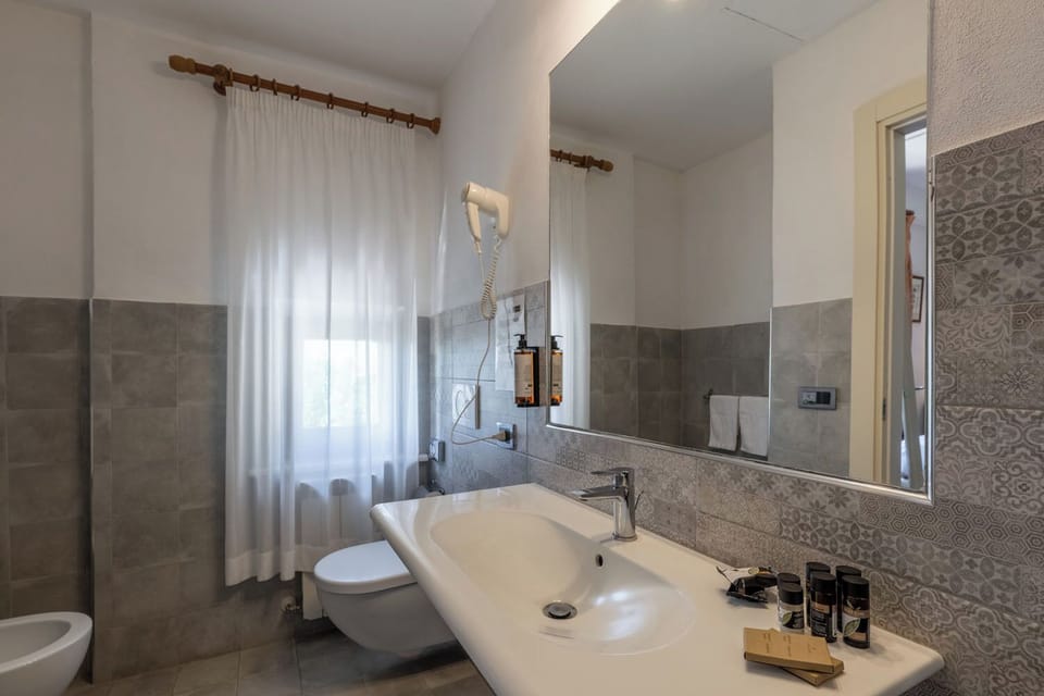 Suite, Hill View | Bathroom | Free toiletries, hair dryer, slippers, towels
