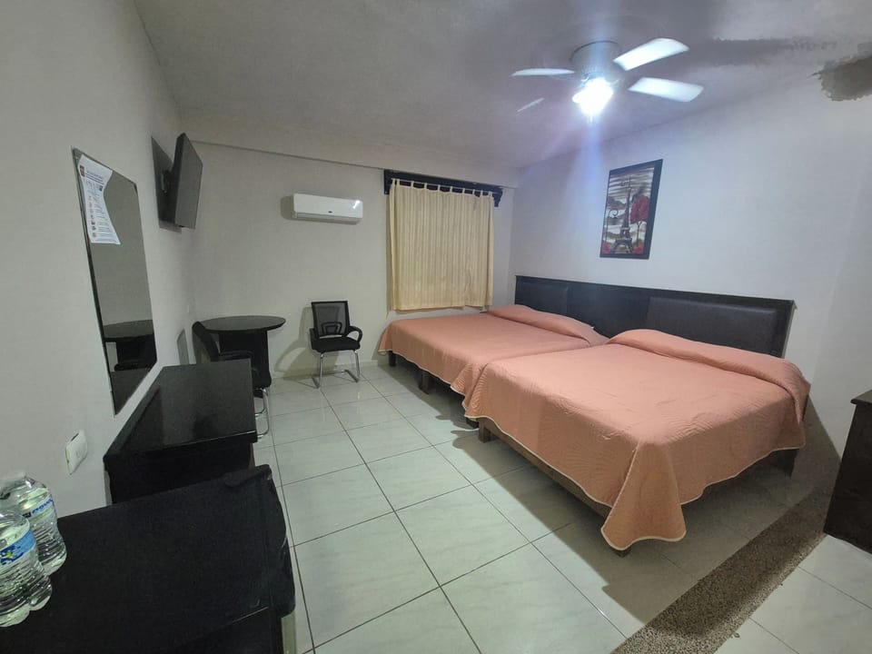 Deluxe Quadruple Room, Balcony, Poolside | Desk, laptop workspace, WiFi (free)