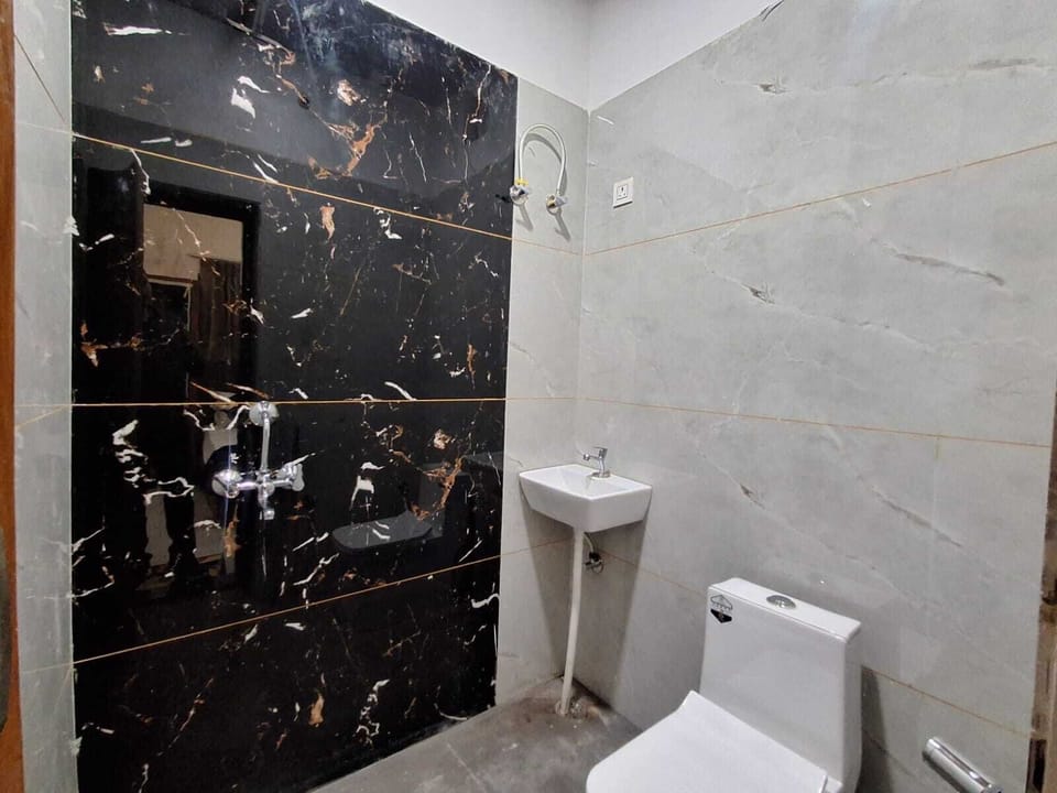 Shower, towels, soap, toilet paper