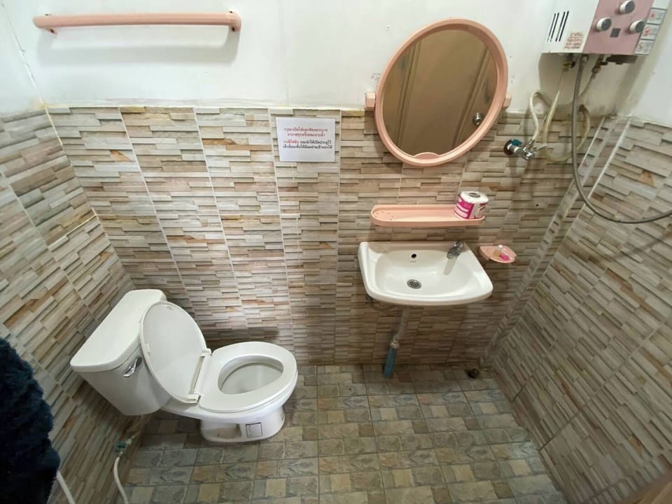 Shower, towels, toilet paper