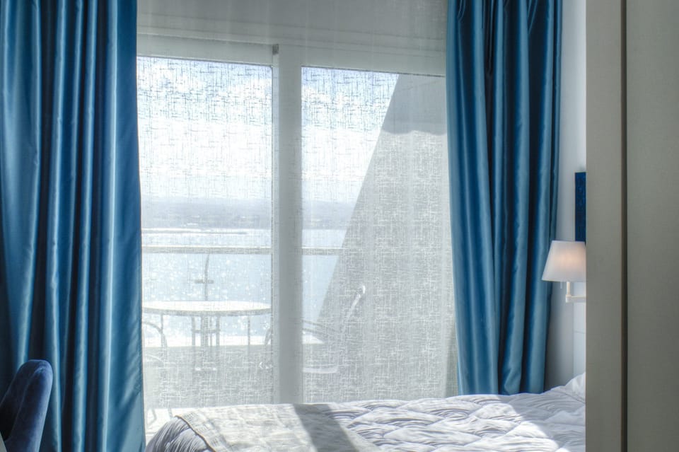 Comfort Room, Balcony, Sea View | In-room safe, WiFi (free)