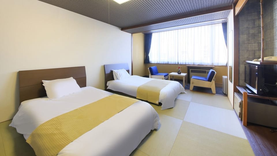 Economy Twin Room - No Pets, Non Smoking | In-room safe, WiFi (free), bed sheets