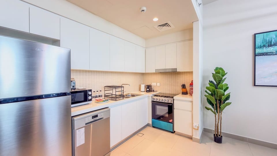 Deluxe Apartment, Balcony, Harbor View | Private kitchen | Coffee/tea maker