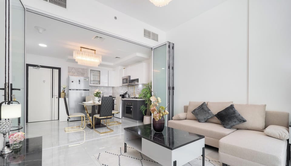 Deluxe Apartment, Balcony, City View | Living area | 65-inch LCD TV with cable channels