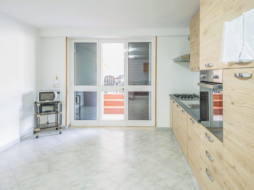 Apartment, Patio, Pool View | Private kitchen