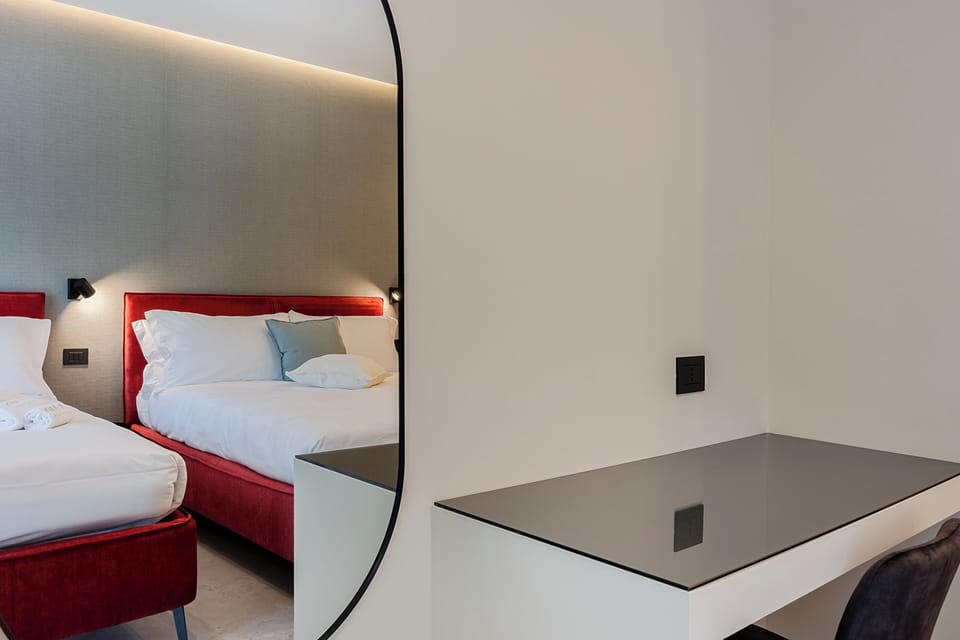 Luxury Triple Room, Balcony, Garden View | In-room safe, desk, laptop workspace, blackout drapes