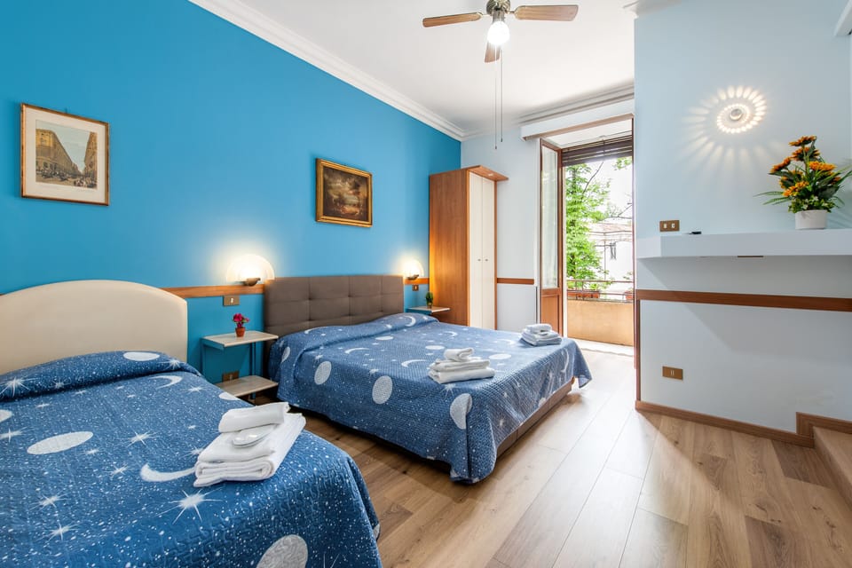 Quadruple Room | Premium bedding, in-room safe, desk, free WiFi