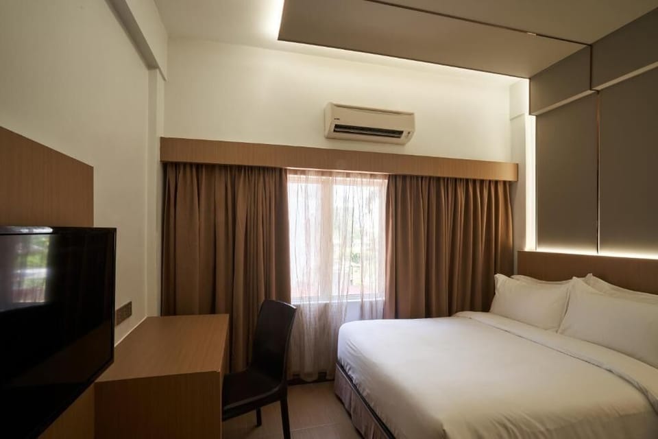 Deluxe Double Room, City View | Blackout drapes, iron/ironing board (on request), WiFi (free)