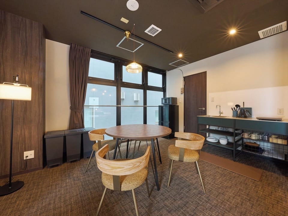 Deluxe Apartment, Balcony, City View | In-room dining