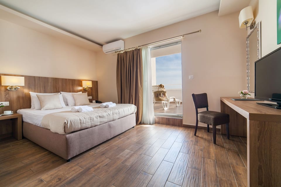 Deluxe Double Room, 1 Double Bed, Terrace, Sea View | Premium bedding, minibar, in-room safe, desk