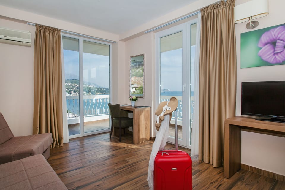 Panoramic Suite, 2 Bedrooms, Terrace, Sea View 1 | Premium bedding, minibar, in-room safe, desk