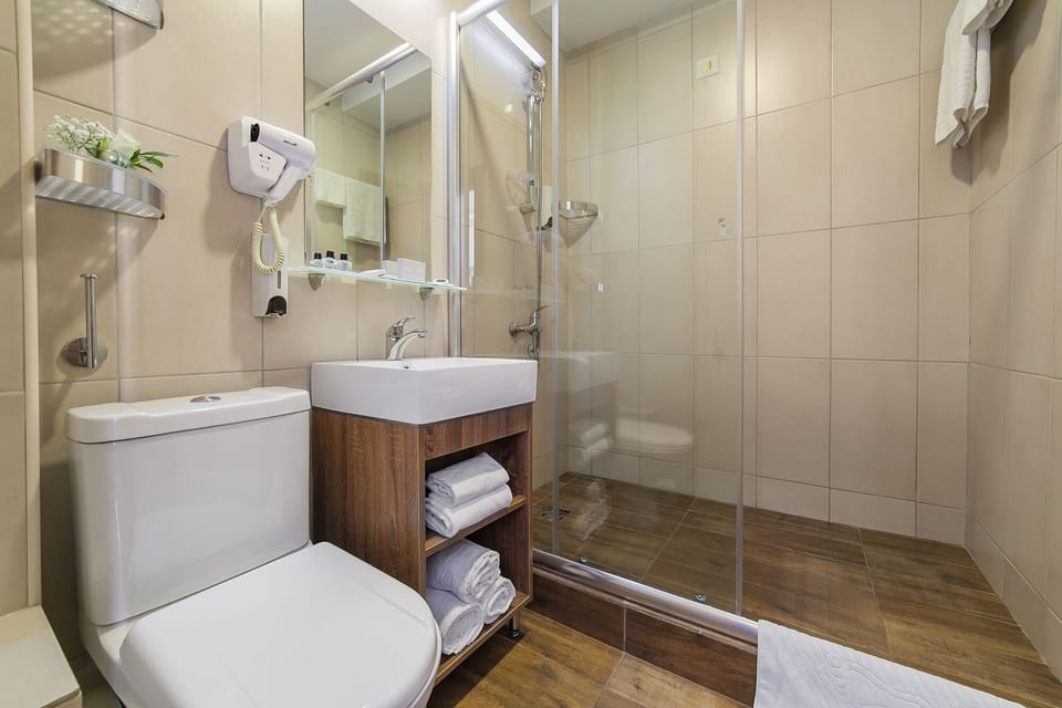 Classic Double or Twin Room, 1 Bedroom, Balcony, Partial Sea View | Bathroom | Shower, free toiletries, hair dryer, towels