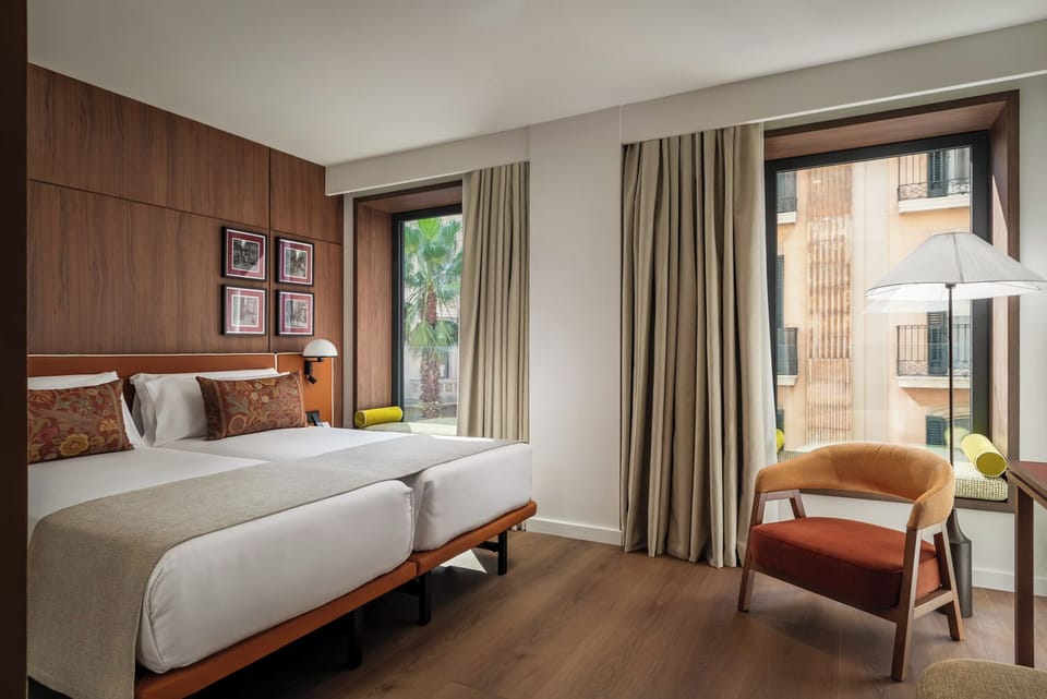 Deluxe Room | Down comforters, minibar, in-room safe, desk