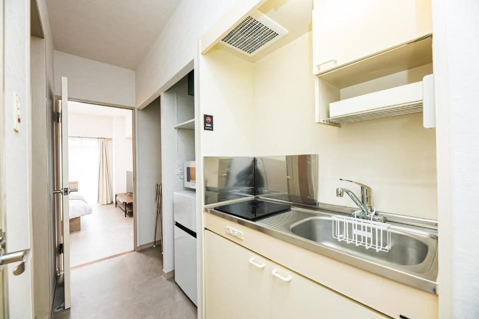 Standard Double Room | Private kitchen | Fridge, microwave, stovetop, electric kettle