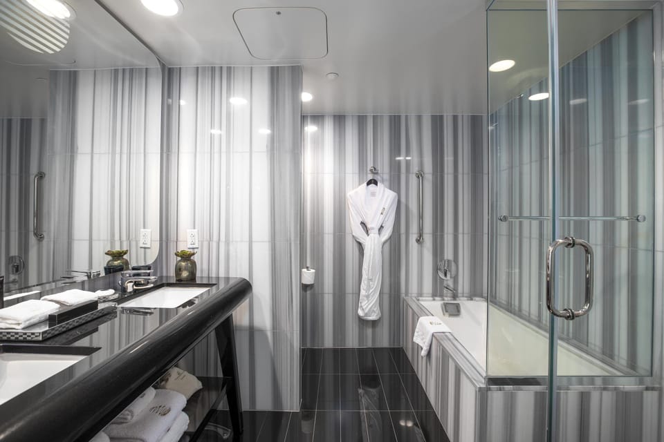 Designer toiletries, hair dryer, bathrobes, slippers