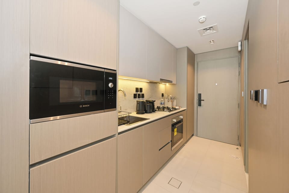 Apartment, Balcony, Pool View | Private kitchen
