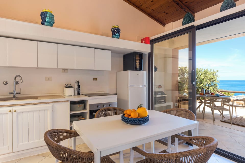 Deluxe Suite, 2 Bedrooms, Sea View | Private kitchen | Espresso maker, fridge, electric kettle, toaster