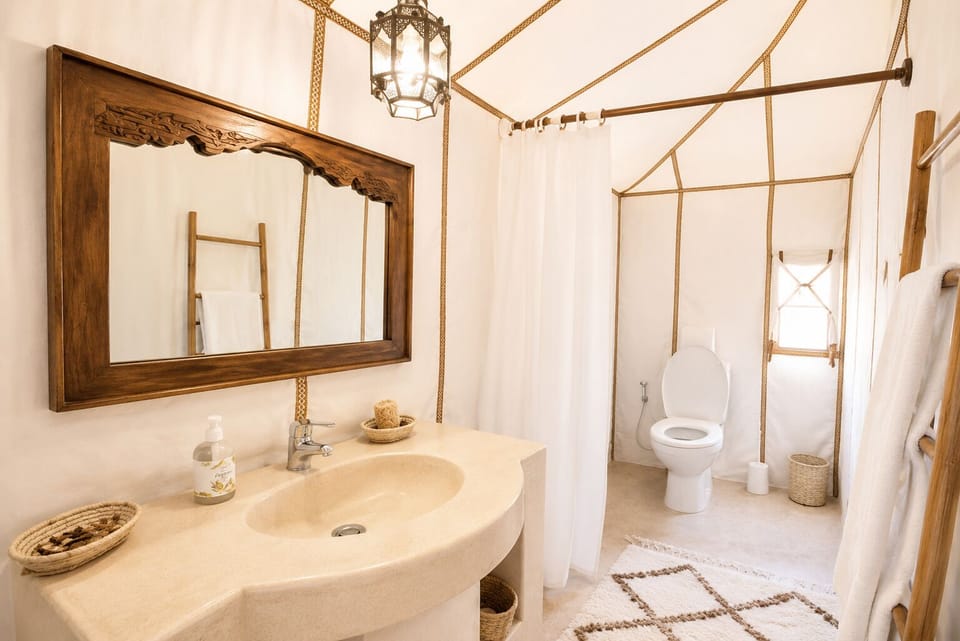 Separate tub and shower, towels, shampoo, toilet paper