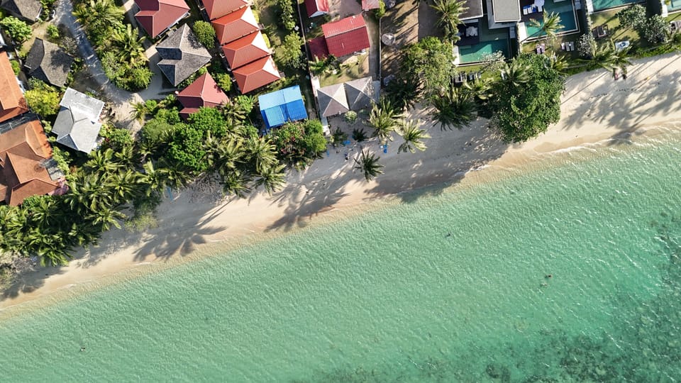 Beach nearby, white sand, beach towels