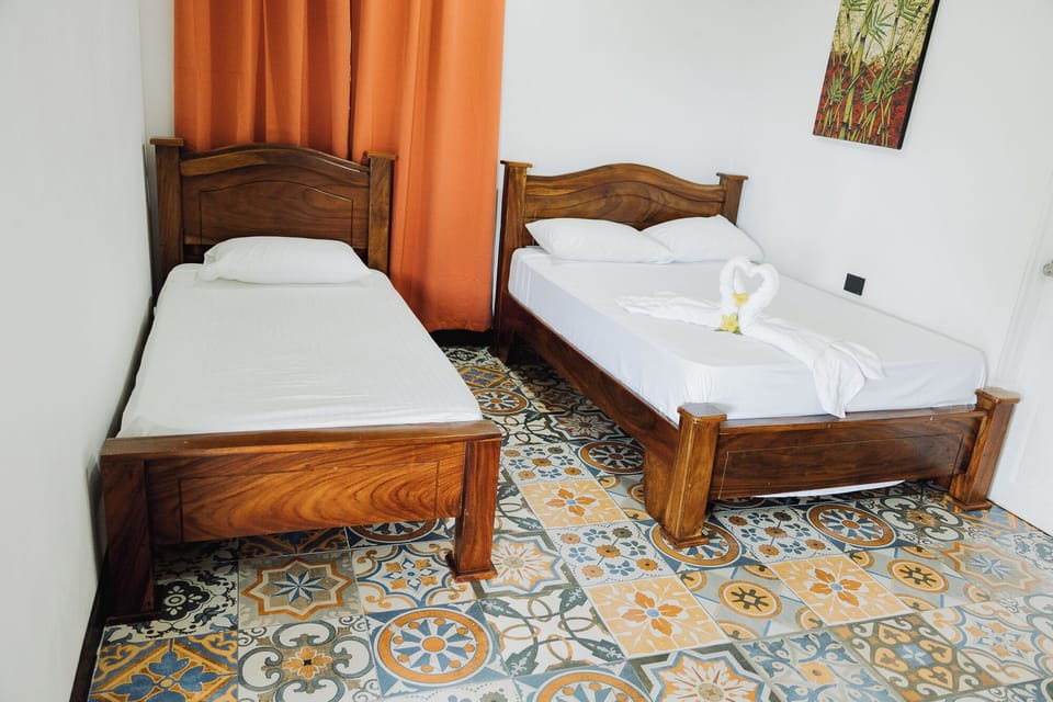 Family Room, Balcony, Pool View | WiFi (free), bed sheets