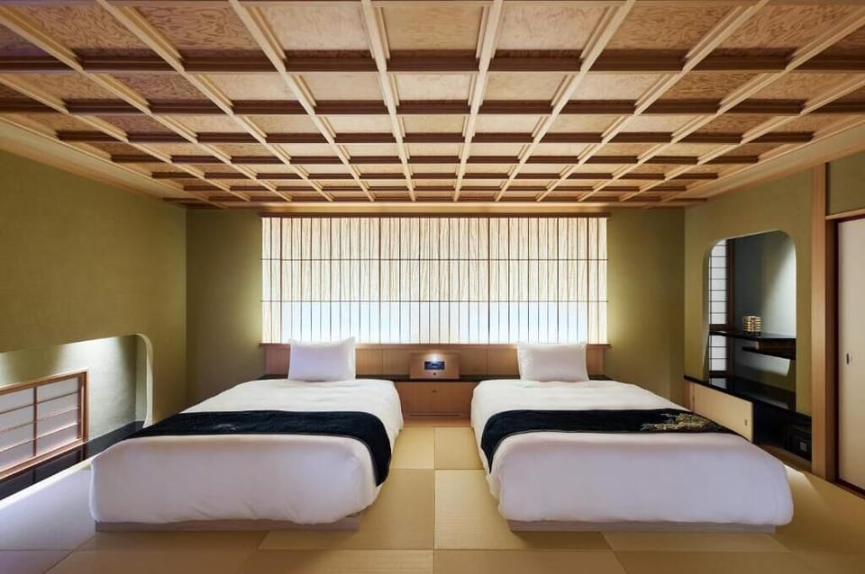 Suite, Garden View | Minibar (free items), in-room safe, WiFi (free), bed sheets