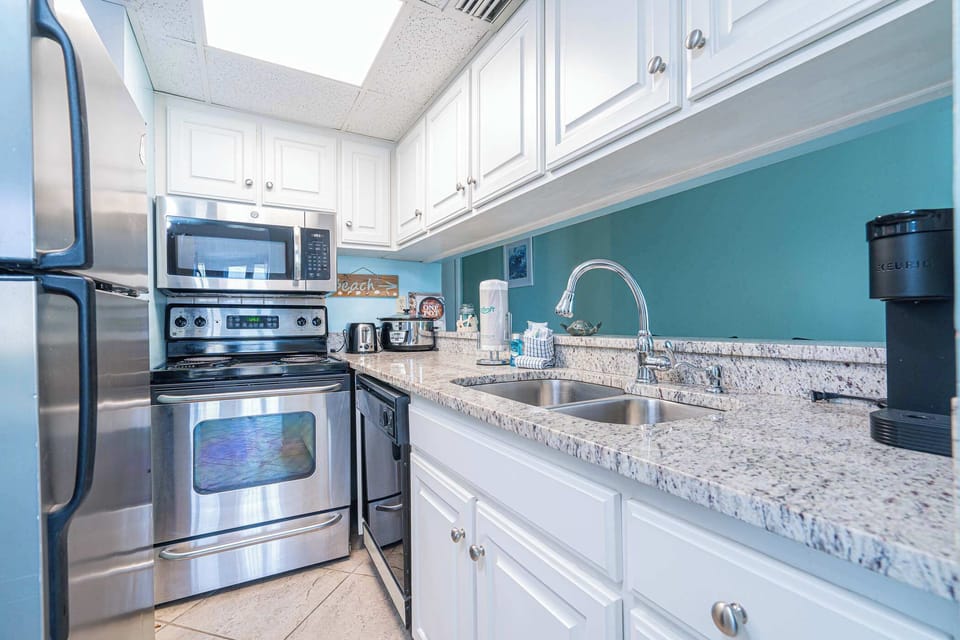 Condo, Multiple Beds, Balcony (Coastal Bliss) | Private kitchen | Coffee/tea maker