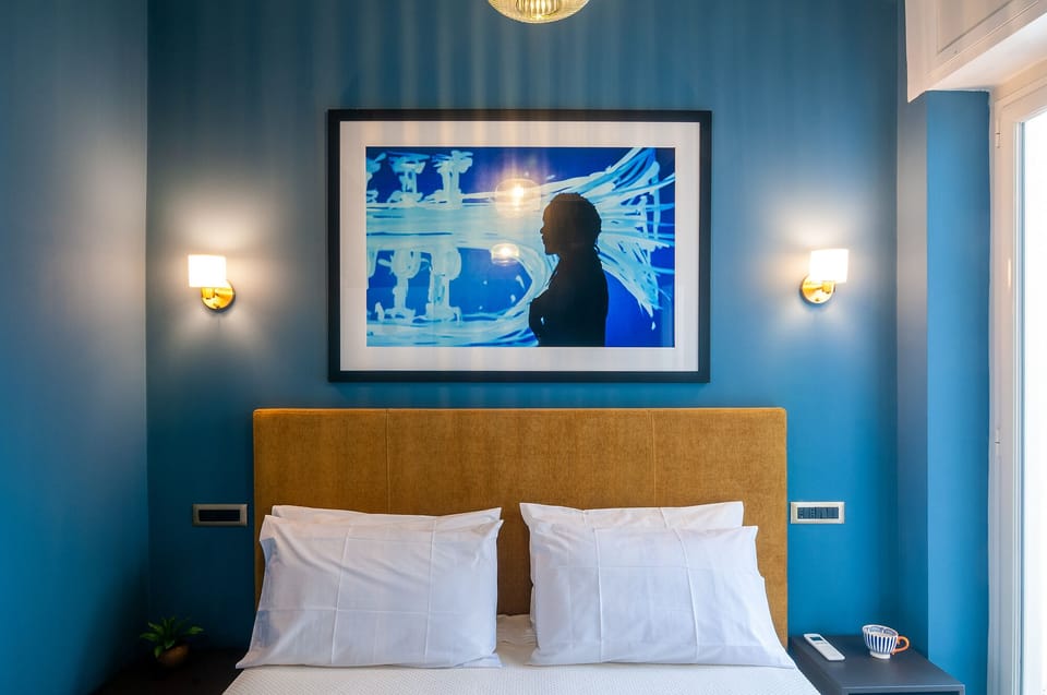 Family Triple Room, Multiple Beds, Balcony, Courtyard View | In-room safe, desk, blackout drapes, soundproofing