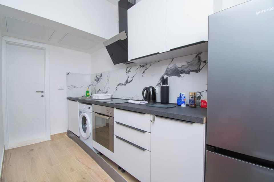 Apartment (A1) | Private kitchen | Espresso maker, fridge, oven, stovetop