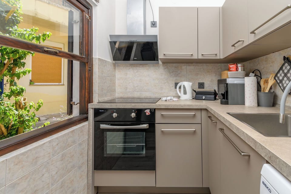 Apartment (A1) | Private kitchen | Espresso maker, fridge, microwave, oven