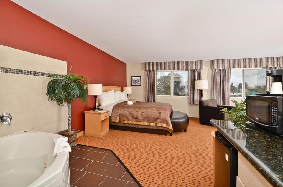 Premium bedding, pillowtop beds, desk, laptop workspace