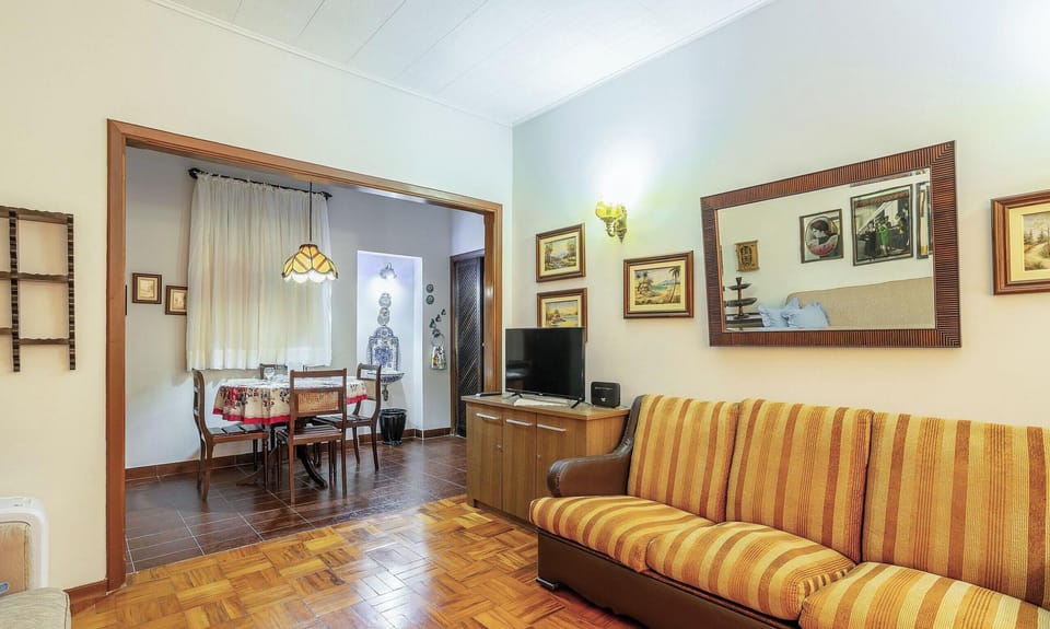 Basic Apartment | Living area | 40-inch TV with digital channels