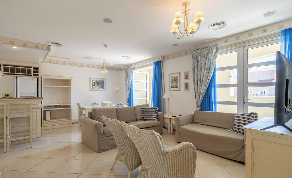 Basic Apartment | Living area | 40-inch TV with digital channels