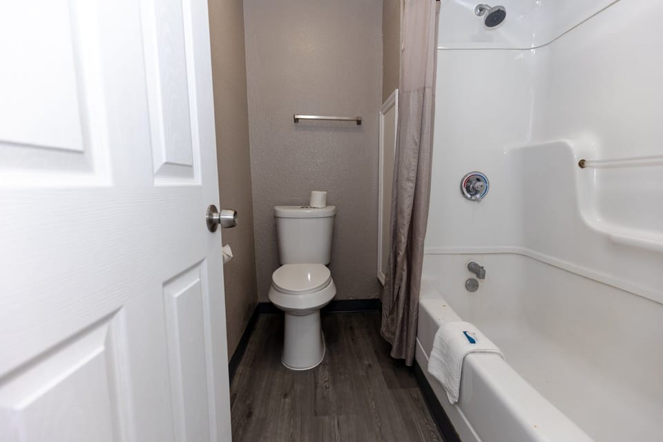 Standard Single Room | Bathroom | Shower, towels, soap, toilet paper